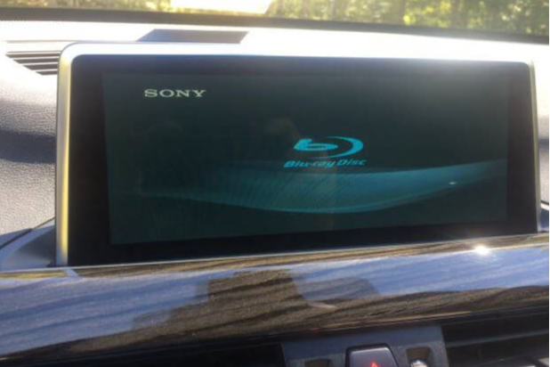 A 2016 BMW X1 F48 iDrive with a Sony Blu-ray player